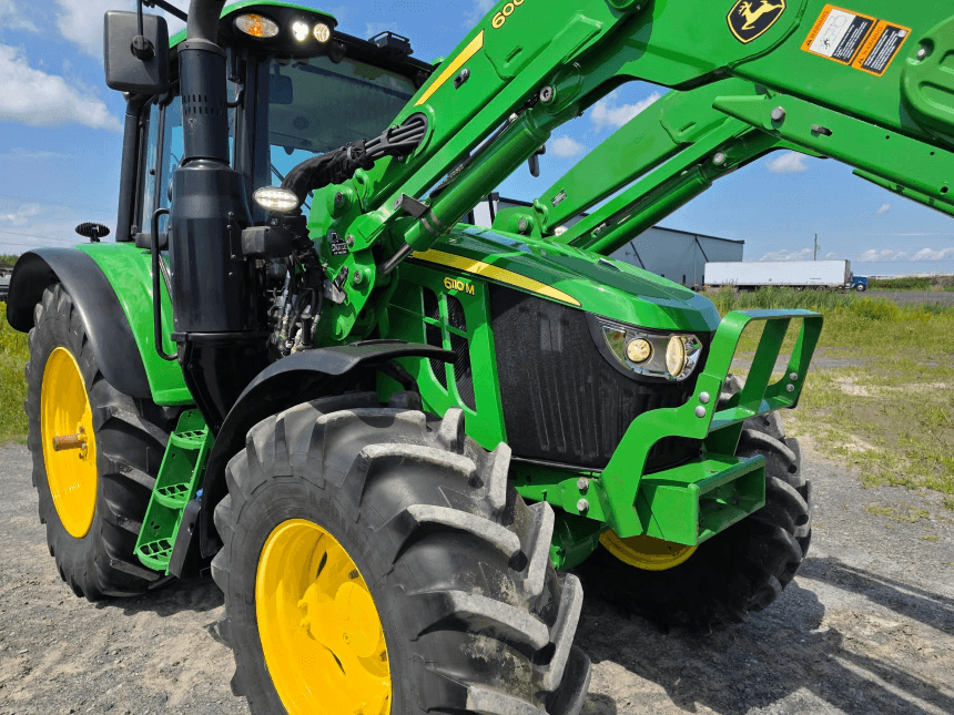 2022 John Deere 6110M Tractor – Front view with loader 2