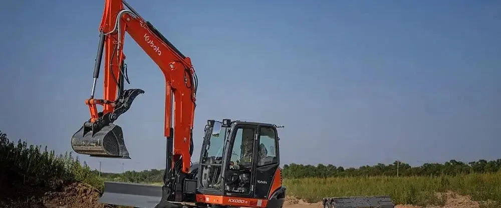 Kubota KX080 compact excavator on a job site