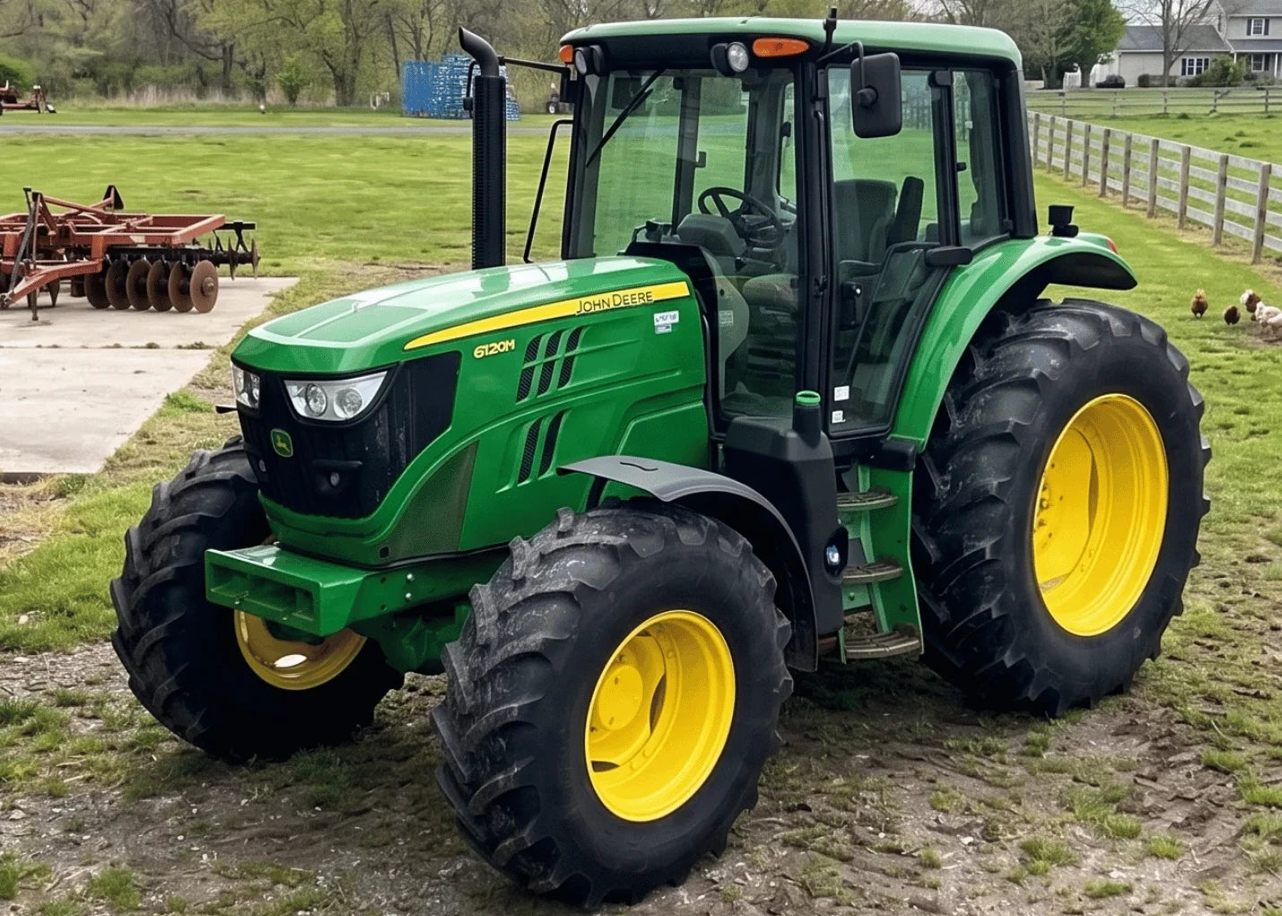 Tracteur John Deere 6120M dans un champ de ferme