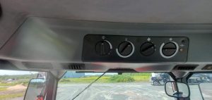 Chargeur sur roues Caterpillar 930M usagé vue arrière gauche avec godet, en vente chez Les Équipements Daigle au Québec
