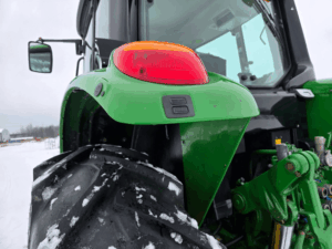 Rear fender and tail light on used John Deere 7330 tractor – Quebec
