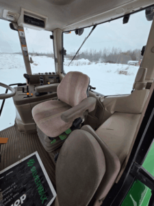 John Deere 7330 cab interior with seat and controls – used tractor – Quebec