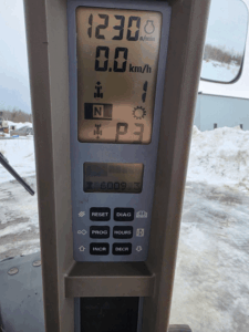 Digital display of the Case IH MX210 showing engine speed and travel speed