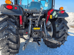 Massey Ferguson 4707 three-point hitch detail with hydraulic connections