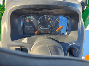 Tableau de bord John Deere 4720 avec compteur d’heures et jauges