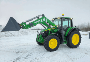 Tracteur John Deere 6120M avec loader frontal levé