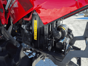 Massey Ferguson 4707 engine with air filtration system and battery