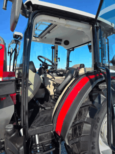 Massey Ferguson 4707 cab interior with operator seat and controls