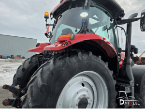 Rear cab and tire of Case IH Maxxum 135 2020