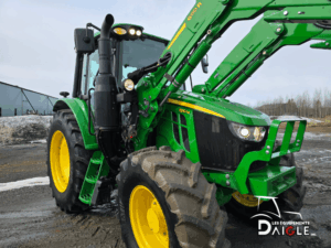 Close-up of the three-point hitch and hydraulic outlets on the John Deere 6110M.