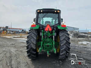 rear view John Deere 6110M tractor with hitch