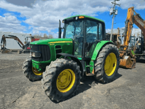2010 John Deere 6430 tractor front left view in excellent condition