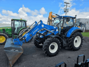 2016 New Holland T5.105 tractor with Stoll loader front left view
