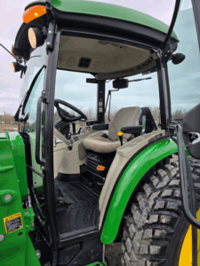 John Deere 4066R cab seat and controls