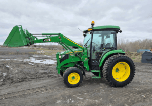John Deere 4066R tractor with front loader side view