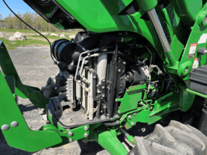 Engine compartment of the 2019 John Deere 5075E tractor.