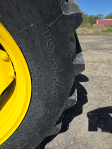 Rear agricultural tire on the 2019 John Deere 5075E tractor.