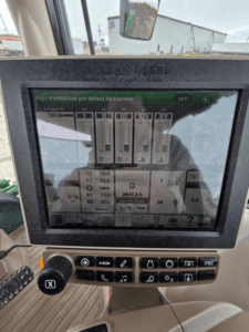 John Deere display screen showing tractor settings on the 6155R.