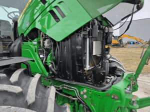 Detailed view of the engine and radiator on the John Deere 6155R.