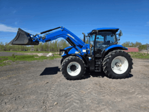 Side view of 2020 New Holland T6.180 tractor with front loader