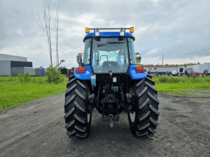 Rear view of a 2008 New Holland TD95D tractor for sale.