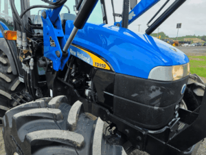 New Holland TD95D hood detail with front-end loader.