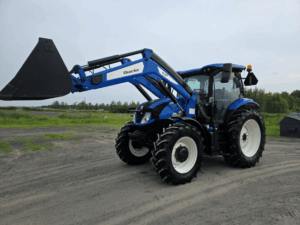 Front three-quarter view of a 2022 New Holland T6.145 tractor with Quicke Q6M loader and cab.