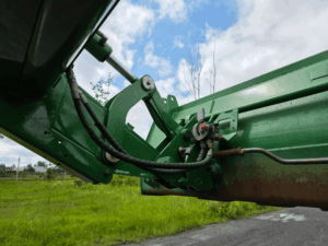 John Deere 620R front loader suspension system