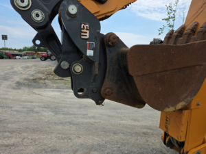 Rear quick coupler on a Case 580 Super N WT backhoe loader