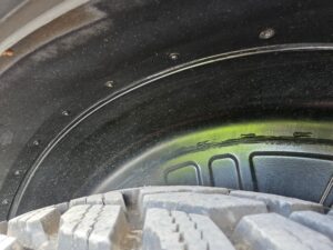 Rear fender and wheel well of a Fendt 512 Vario tractor