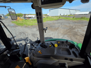 Right-side control console inside a 2020 John Deere 5115M tractor.