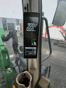 Digital display inside a 2021 John Deere 6140M tractor showing 2,890 operating hours.