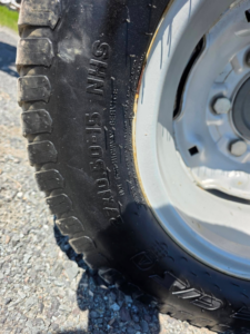 Industrial front tire on Massey Ferguson 1758H tractor