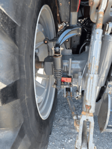 Rear axle and hitch detail on Massey Ferguson 6616 tractor