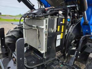 New Holland T5.120 engine compartment with accessible radiator