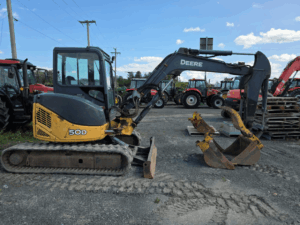 Side view of a used 2007 John Deere 50D excavator with rubber tracks