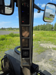 Dashboard showing 2,214 hours on the Case IH Maxxum 125