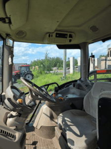 Operator station of a 2017 John Deere 6110R tractor