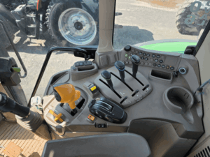 Cab and controls of a 2021 John Deere 6110M tractor with PowrQuad Plus transmission