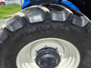 Front 380/85R30 tire on the 2022 New Holland T6.145 tractor in excellent condition