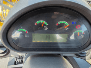 Caterpillar 926M instrument panel showing operating hours