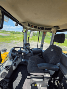 Caterpillar 926M control console with joystick