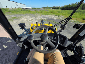 Operator's view inside the John Deere 244K-II wheel loader