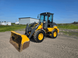2018 John Deere 244K-II wheel loader front left view with bucket