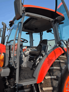 Cab of the 2019 Kubota M5-111 tractor with the door open