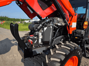 Engine compartment of the 2019 Kubota M5-111 tractor with hood open for inspection