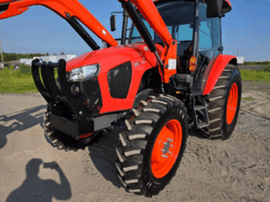 Front of the 2019 Kubota M5-111 tractor with front tires and heavy-duty bumper