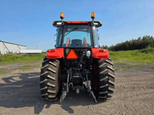 Rear of the 2019 Kubota M5-111 tractor with three-point hitch and cab