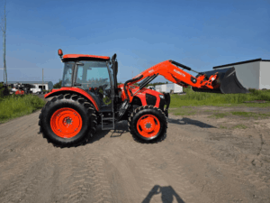 Right side view of the 2019 Kubota M5-111 tractor with front loader