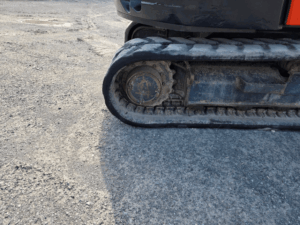 Left rubber track on the Kubota KX080-4 excavator